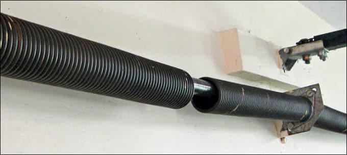 #garagedoorrepair Garage spring repair King County